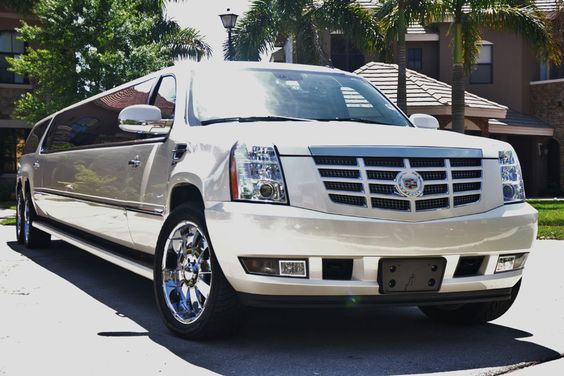 white cadillac escalade limo