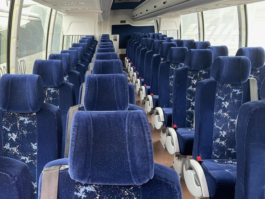 Cloth seats charter bus