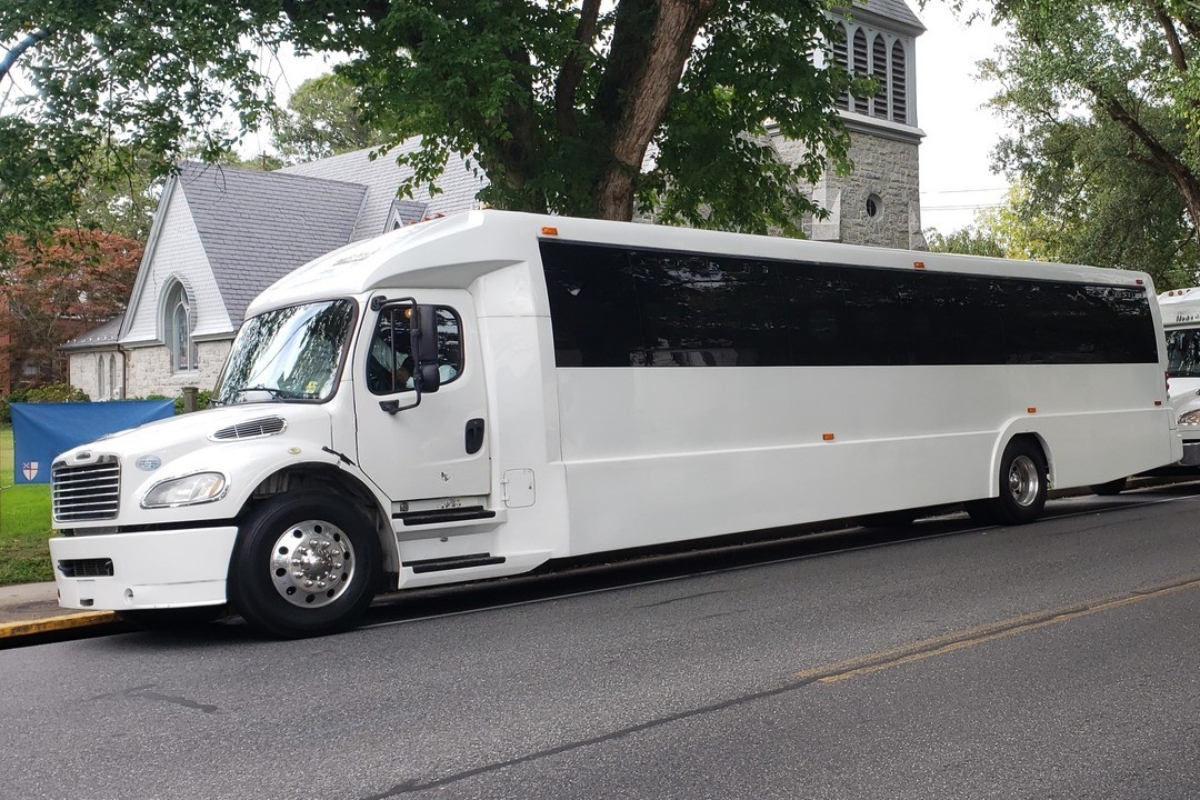 Photo of white party bus exterior